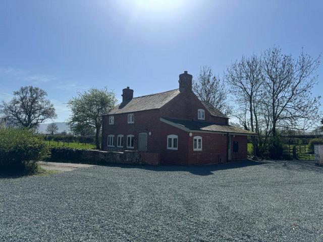 House at A483, Four Crosses