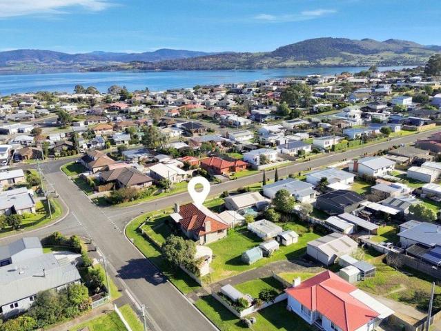 House, garages and development potential across three titles