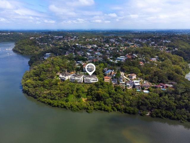 House Like Apartment with Water Panoramas and Prized Peninsula Location