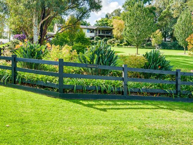 House set on 1 acre in the heart of Kurrajong Village, a short walk to the shops, cafes,and restaurants