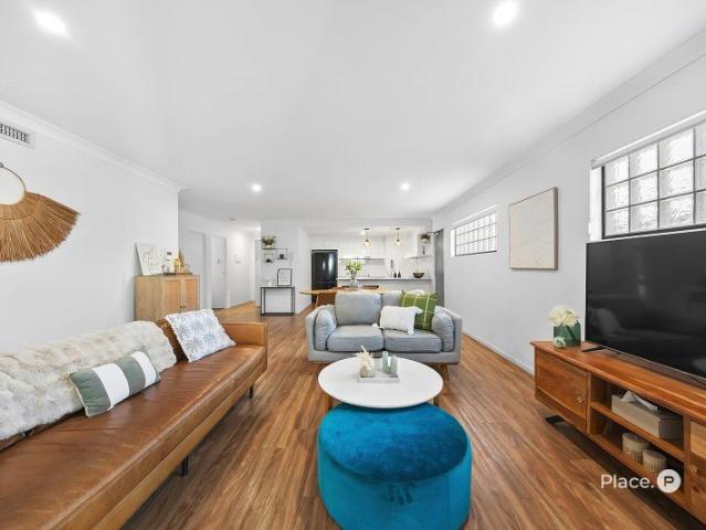 HOUSE SIZED LIVING WITH THE EASE OF APARTMENT LIFE
