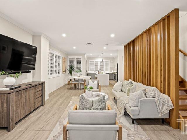 House Sized Living with Architectural Edge and City Glimpses