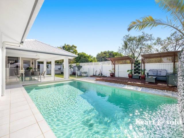 Huge Pool, Soaring Ceilings + Space for All the Toys
