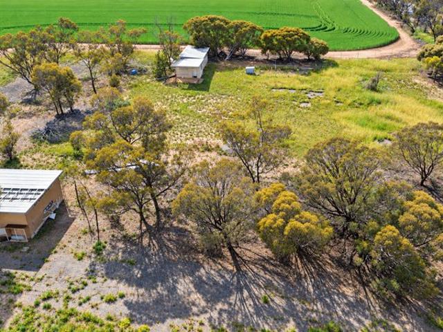 HUGE POTENTIAL OPPORTUNITY 2.63 Acres with Sheds, Powered Sites and Loads of Potential SOLD AS IS