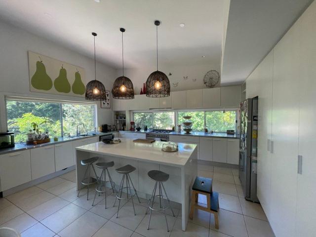 HUGE STUNNING ARCHITECTURAL HOME IN PICTURESQUE HILLS SETTING