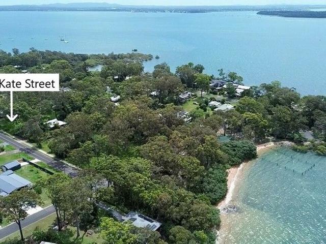 Huge 1282m2 Block with Dual Street Access & Water Views Walk to Swimming Enclosure