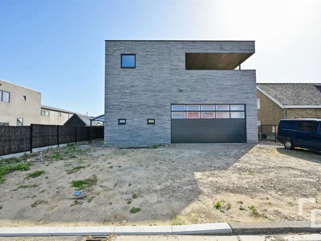 Huis te huur in Merkem met 4 slaapkamers