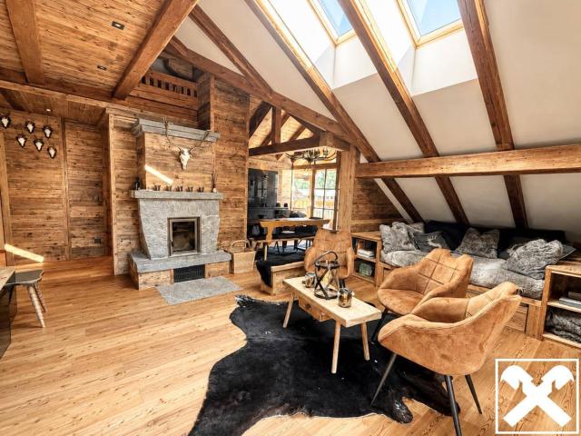 Hüttenzauber: Exklusive Alpenchalet Wohnung im Loft Stil