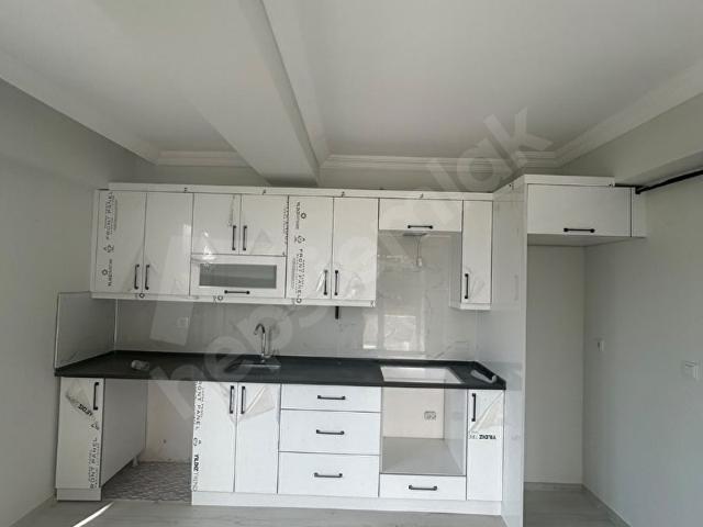 HUZUR EMLAK'TAN 50. YIL MEVKİİNDE UYGUN FİYATA SATILIK 1+1 SIFIR DAİRE BU FIRSAT KAÇMAZ