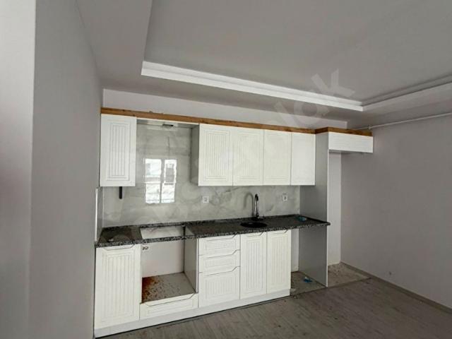 HUZUR EMLAK'TAN BENGİLER MAHALLESİNDE ŞEHRİN MERKEZİNDE SATILIK 1+1 SIFIR DAİRE