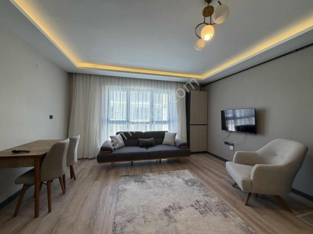 İncek'te Cam Balkonlu Fiber Alt Yapılı Lüks Eşyalı 1+1 Kiralık