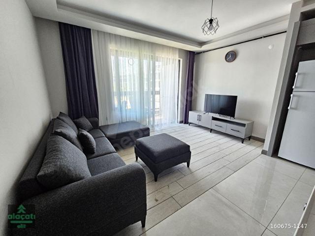 İncek Taşpınar'daEşyalı KiralıkAra Kat1+1 DaireCam Balkonlu