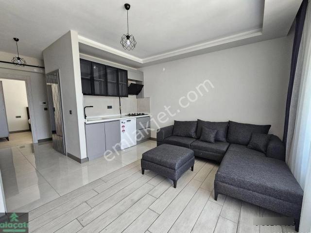İncek Taşpınar'da/eşyalı Kiralık/ara Kat/1+1 Daire/cam Balkonlu