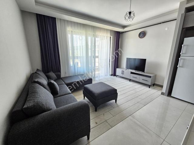 İncek Taşpınar'da/eşyalı Kiralık/ara Kat/1+1 Daire/cam Balkonlu