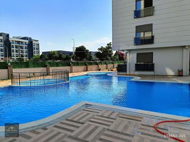 İNNOVİA SİTESİNDE eşyalı ve eşyasız HAVUZLU KATTA 1+1 DAİRE