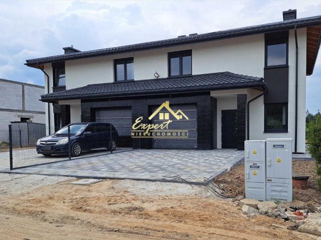 Nowoczesny bliźniak 132 m2 z garażem i dużym poddaszem