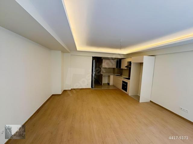 ŞİŞLİ KOCAMANSUR SOK 1+1 SIFIR BİNADA YÜKSEK GİRİŞ KAT