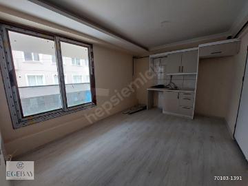 ŞİRİNYER LALELİ MH.DE TOPLU ULAŞIM ARAÇLARINA YAKIN KONUMDA 1+1