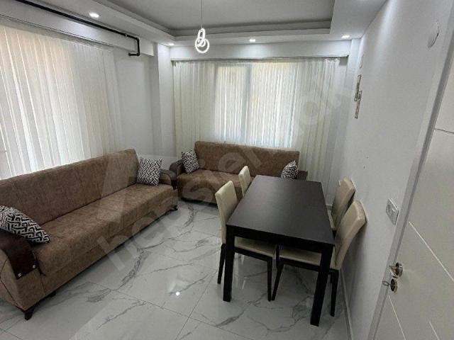 ÇİVRİL KIZICASÖĞÜT ÜNİVERSİTE YANINDA 2+1 ZEMİN KAT EŞYALI SIFIR SATILIK DAİRE