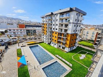 İzka North Mavişehir'de Kiralık Açık Mutfak Havuz Manzaralı 2+1