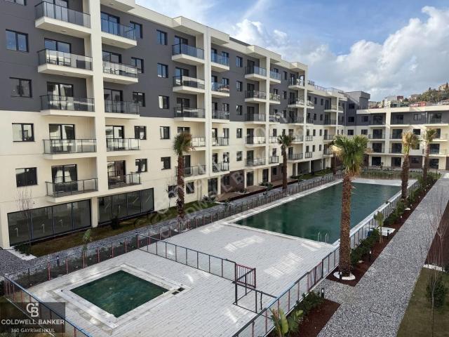 İzka Park Yaşam Atlantis Sitesinde Satılık Havuz Cephe 1+1 Daire