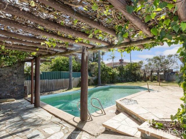 IDEAL LOCATION WITH A POOL!