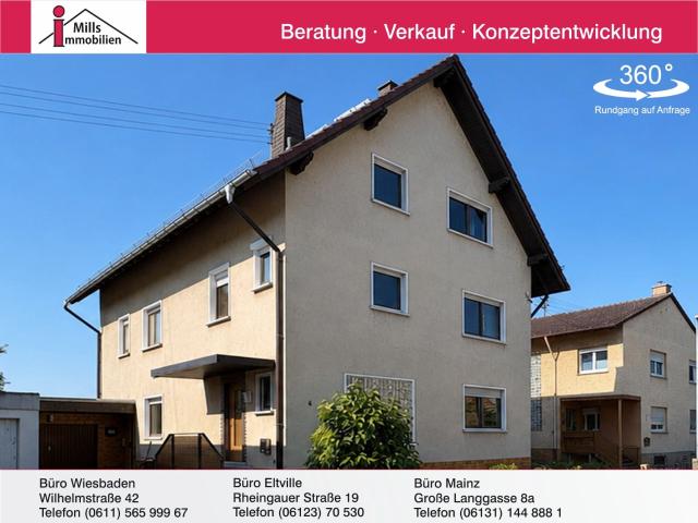 Ideales freistehendes Zweifamilienhaus mit Garten und traumhaften Weitblick in guter Lage