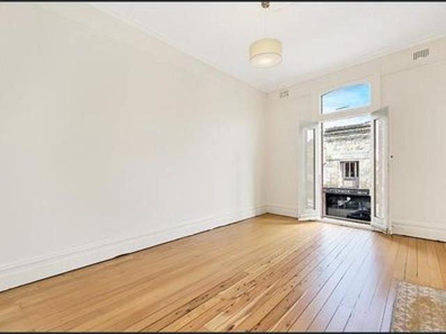 Ideally located, dual level home with courtyard