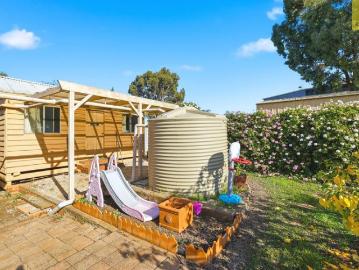 IDEALLY LOCATED FAMILY HOME