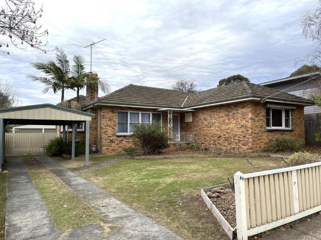 IDEALLY LOCATED THREE BEDROOM HOME