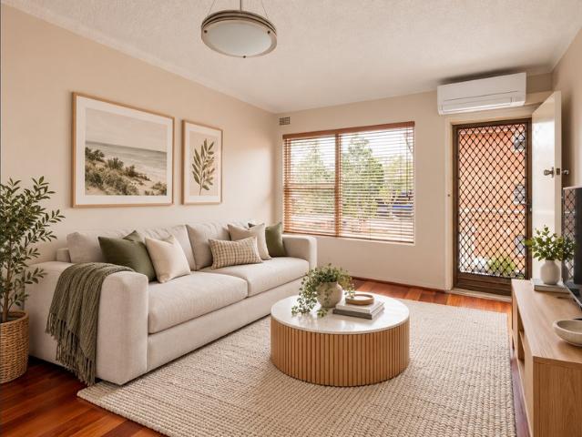 IDEALLY POSITIONED 1ST FLOOR UNIT
