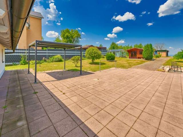 Idyllisches Wohnen im Grünen Gepflegte Doppelhaushälfte auf großem Grundstück mit Potenzial