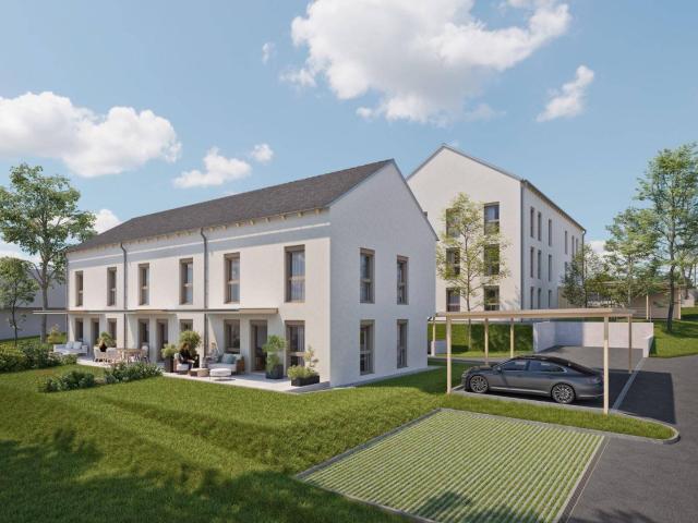 Neubau Highlight – Stilvolle 3 Zimmer Wohnung mit Küche, Balkon und Carportparkplätze geförderte Miete 3 Zimmer