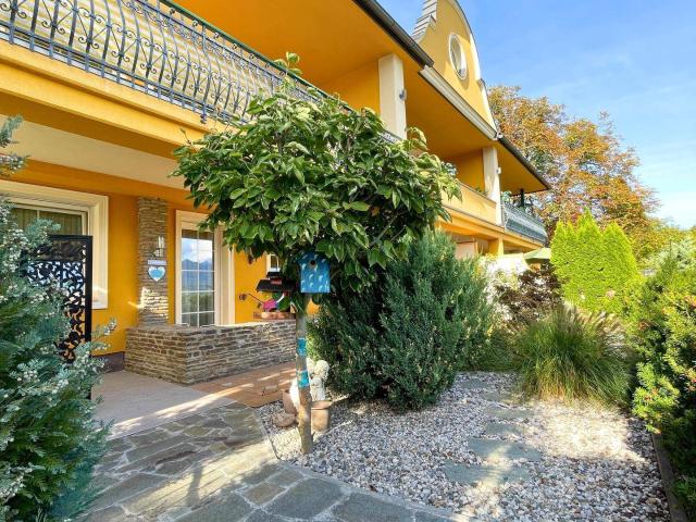 Ihr neues Zuhause zwischen See und Bergen – stilvolle 3 Zimmer Wohnung mit Garten
