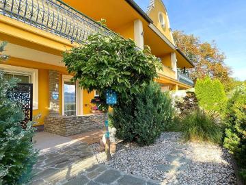 Ihr neues Zuhause zwischen See und Bergen – stilvolle 3 Zimmer Wohnung mit Garten
