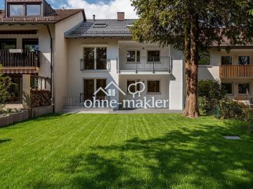 Ihr neues Zuhause: Exklusiv modernisierte 4 Zimmer Wohnung mit großem Garten