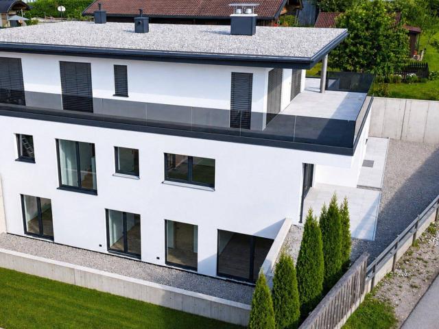 Exklusive Haushälfte in Bad Häring – Erstbezug mit Garten und großzügigen Sonnenterrassen