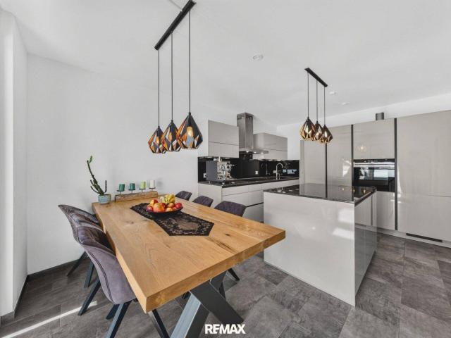 Ihr neues Zuhause mit Kaiserblick stilvolle Dachgeschosswohnung in Niederndorf zu kaufen!