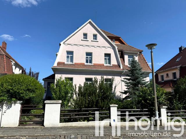 Ihr Zuhause mit zusätzlichem Mietertrag Zweifamilienhaus mit Garten und Garage