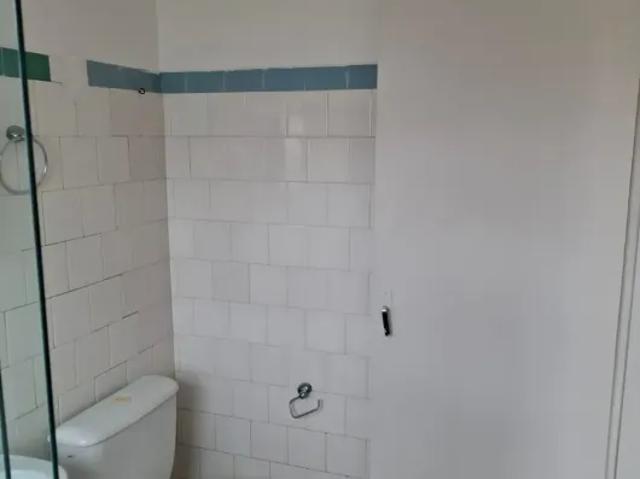 Imóvel de vila com sala, cozinha, banheiro e área de serviço