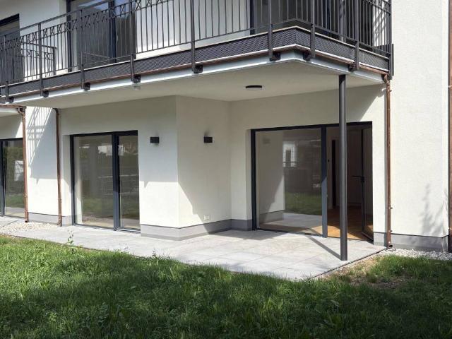 Im Quartett Gartenwohnung Erstbezug