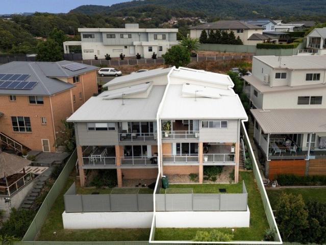 Immaculate modern duplex with district views