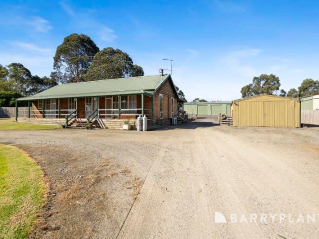 Immaculate Acreage Living with Exceptional Shedding & Future Potential