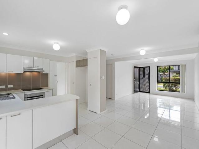 IMMACULATE AIR CONDITIONED 3 BEDROOM TOWNHOUSE IN POPULAR, CENTRALLY LOCATED COMPLEX