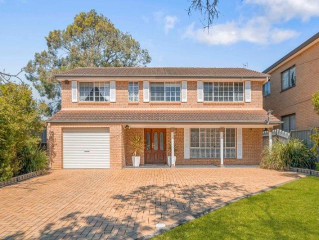 IMMACULATE BRICK FAMILY HOME IN SOUGHT AFTER LOCATION