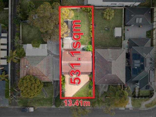 IMMACULATE BRICK FAMILY HOME IN SOUGHT AFTER LOCATION