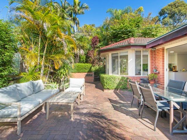 Immaculate brick home with sunny family appeal