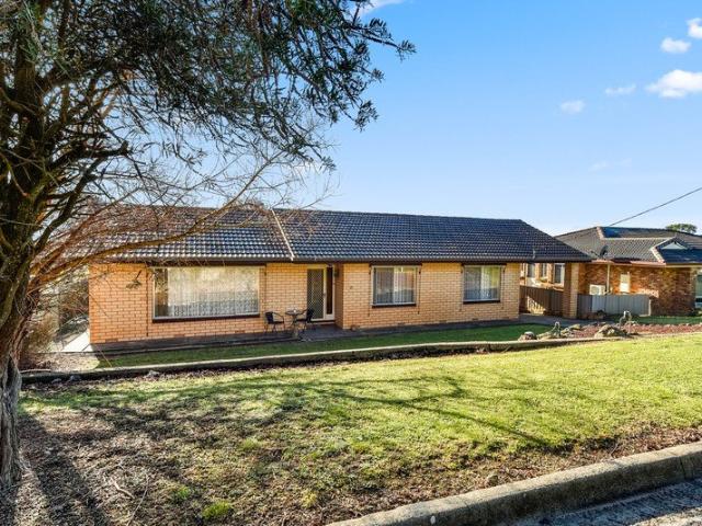 Immaculate Brick & Tile Home !