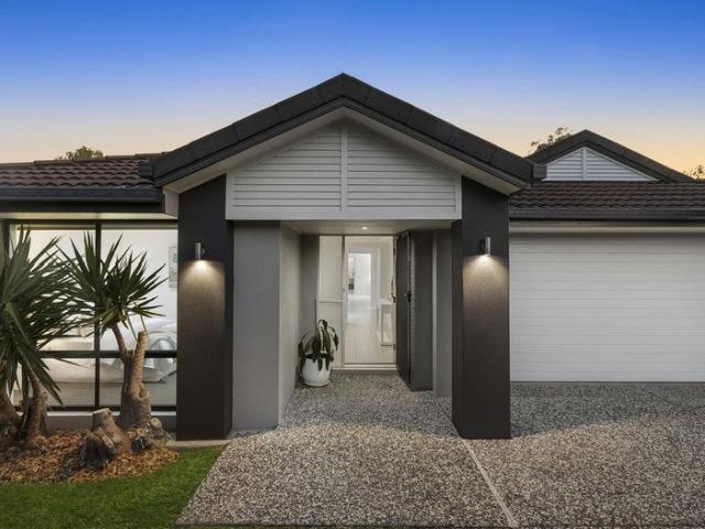 Immaculate Condition, Low Maintenance with 3 Living Areas!
