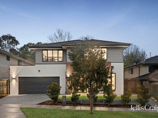 Immaculate contemporary residence in serene cul de sac setting